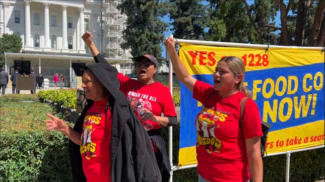 Fast food workers and union activists demonstrate outside the California State Capitol to rally support for legislation to increase fast-food worker wages to $20 an hour, Friday, Sept. 15, 2023, in Sacramento, Calif. (AP Photo/Terry Chea)