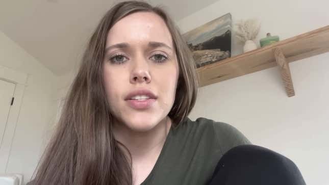 Jessa Duggar Seewald, wearing a olive green shirt, speaks to the camera in a YouTube video.