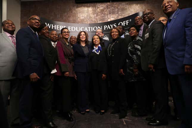 WASHINGTON, DC - FEBRUARY 07: Democratic presidential candidate Sen. Kamala Harris (D-CA) (C) poses for a group photo with leaders from historically black colleges and universities during a Thurgood Marshall College Fund event at the JW Marriott on February 07, 2019, in Washington, DC. Harris officially announced her candidacy for president of the United States on January 21
