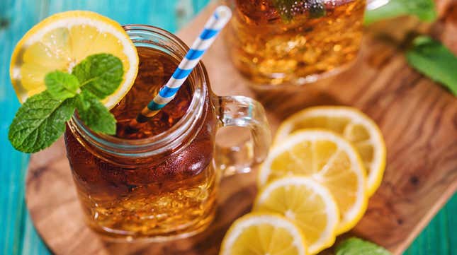 Sweet tea with lemon in mason jar glass