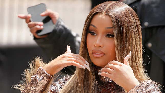 Image for article titled Cardi B Hurls Microphone at Woman Who Threw a Drink at Her Onstage