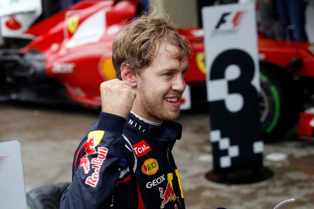 Red Bull driver Sebastian Vettel, of Germany, celebrates after the Formula One Brazilian Grand Prix
