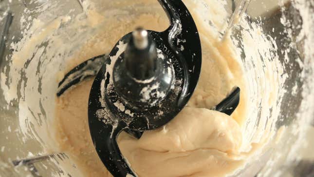 Tapioca dough inside of a food processor bowl.
