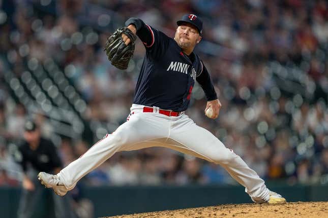 Apr 11, 2023; Minneapolis, Minnesota, USA; Minnesota Twins relief pitcher Caleb Thielbar (56) pitches to the Chicago White Sox in the eighth inning at Target Field.