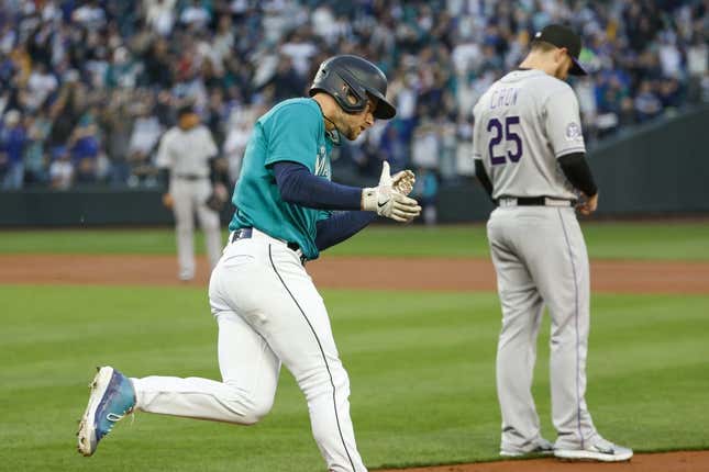 Apr 14, 2023; Seattle, Washington, USA; Seattle Mariners left fielder Jarred Kelenic (10) celebrates after hitting a two-run home run against the Colorado Rockies during the second inning at T-Mobile Park.