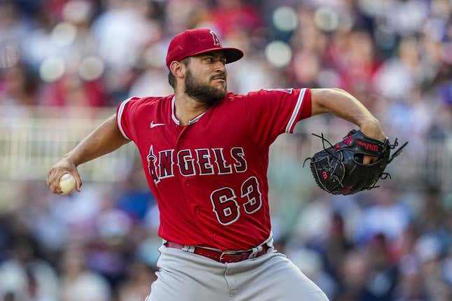Jul 31, 2023; Cumberland, Georgia, USA; Los Angeles Angels starting pitcher Chase Silseth (63) pitches against the Atlanta Braves during the first inning at Truist Park.