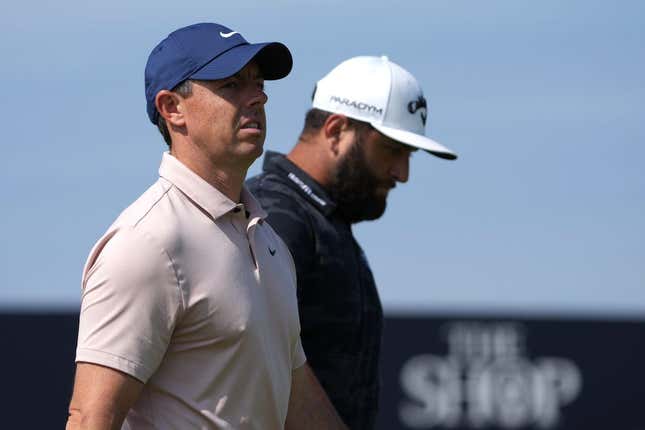 July 20, 2023; Hoylake, England, GBR; Rory McIlroy (left) and Jon Rahm look on during the first round of The Open Championship golf tournament at Royal Liverpool.