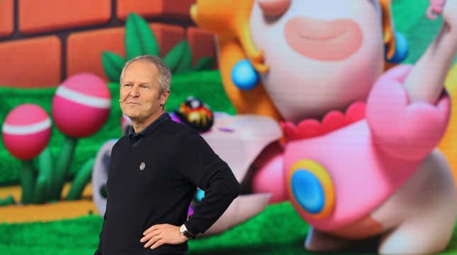 Ubisoft CEO Yves Guillemot stands on stage at E3 after the announcement of Mario + Rabbids. 