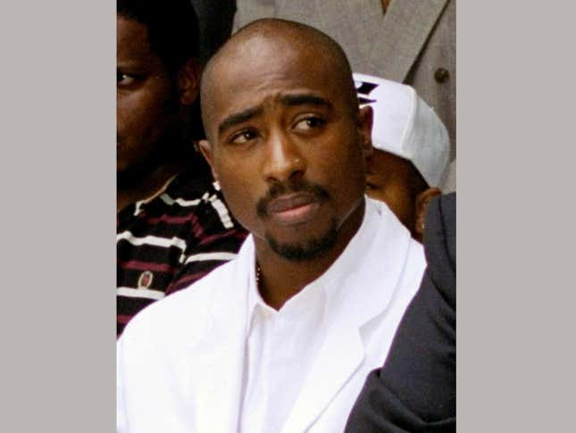 In this Aug. 15, 1996, file photo, rapper Tupac Shakur attends a voter registration event in South Central Los Angeles. Snoop Dogg will induct the late rapper Tupac Shakur into the Rock &amp; Roll Hall of Fame, while Pharrell Williams will induct Nile Rodgers during the ceremony in Brooklyn. The Rock &amp; Roll Hall announced Wednesday, March 29, 2017 additional guests who’ll be on hand April 7 at the Barclays Center to induct this year’s newest class. 