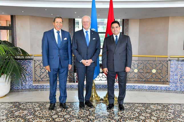 In this image released by Morocco&#39;s Foreign Ministry, Morocco Foreign Minister Nasser Bourita, right, and Morocco&#39;s Permanent Representative to the United Nations Omar Hilale, left, welcome UN Secretary General&#39;s Personal Envoy for Western Sahara, Staffan de Mistura, as he visits the region, in Rabat, Morocco, Friday, Sept. 8, 2023. (AP Photo via Morocco Foreign Ministry)