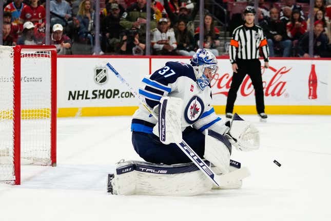 Mar 11, 2023; Sunrise, Florida, USA; Winnipeg Jets goaltender Connor Hellebuyck (37) makes a save against the Florida Panthers during the second period at FLA Live Arena.