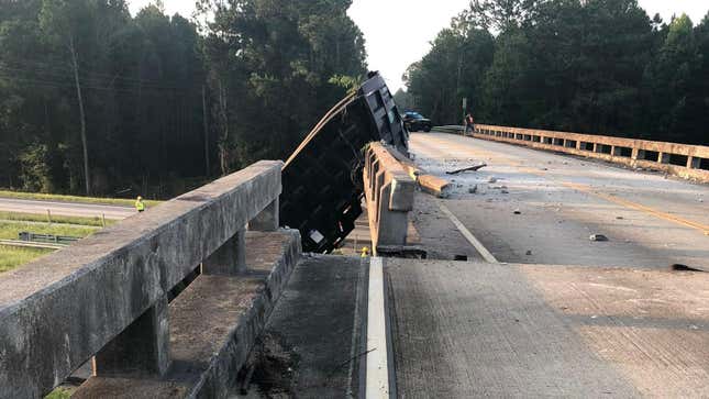 Image for article titled A Dump Truck Crashed Into A Bridge And Pushed It Six Feet Sideways [Update: Demolition Begins]