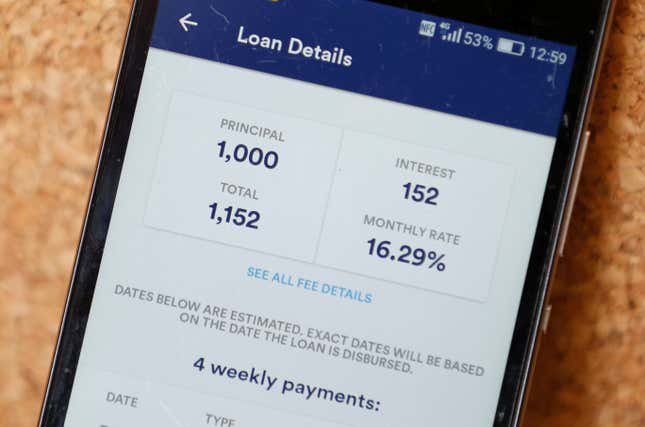 An online financial micro lending platform is seen on a mobile phone in 2018.