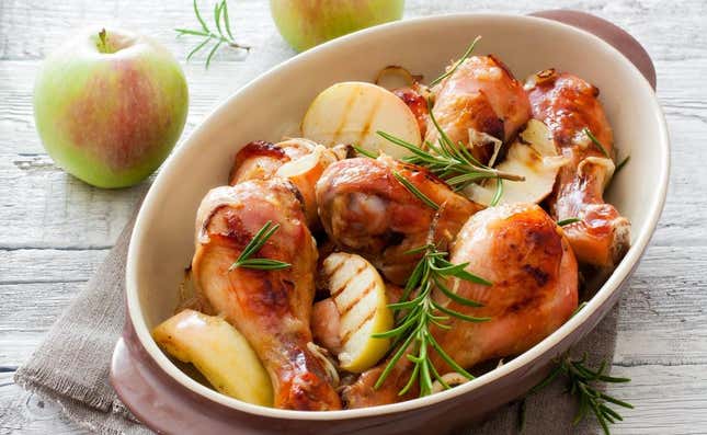 Chicken and apples together in a baking dish