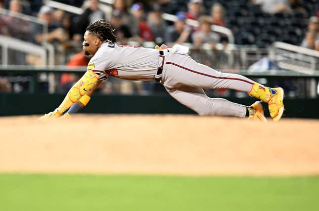 WASHINGTON, DC - SEPTEMBER 21: Ronald Acuna Jr. #13 of the Atlanta Braves slides into third base for a triple in the third inning against the Washington Nationals at Nationals Park on September 21, 2023 in Washington, DC. (Photo by Greg Fiume/Getty Images)