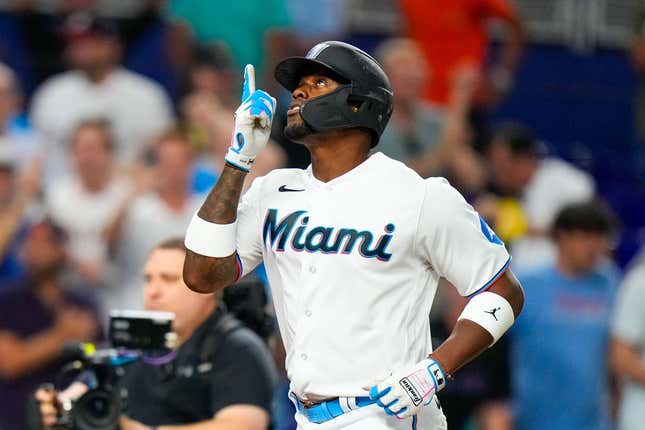 Aug 2, 2023; Miami, Florida, USA; Miami Marlins designated hitter Jorge Soler (12) celebrates hitting a home run against the Philadelphia Phillies during the ninth inning at loanDepot Park.