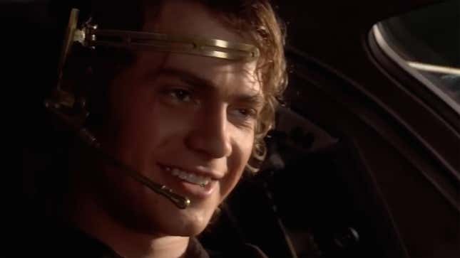 Screenshot from Star Wars: Revenge of the Sith where Anakin Skywalker smiles while piloting a spaceship. 