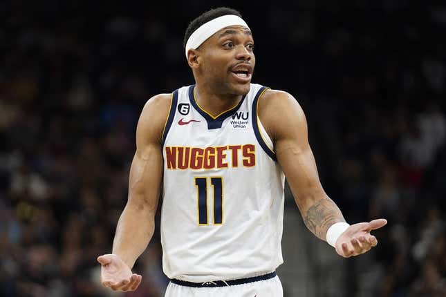 Mar 10, 2023; San Antonio, Texas, USA; Denver Nuggets forward Bruce Brown (11) reacts during the second half against the San Antonio Spurs at AT&T Center.