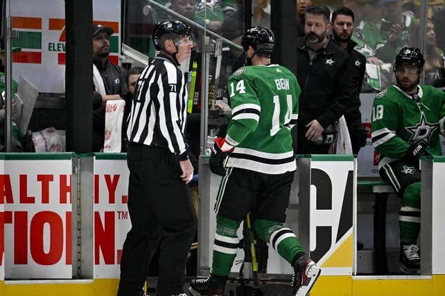 May 23, 2023; Dallas, Texas, USA; Dallas Stars left wing Jamie Benn (14) leaves the ice after receiving a game misconnect for a cross check on Vegas Golden Knights right wing Jonathan Marchessault (81) during the first period in game three of the Western Conference Finals of the 2023 Stanley Cup Playoffs at American Airlines Center.