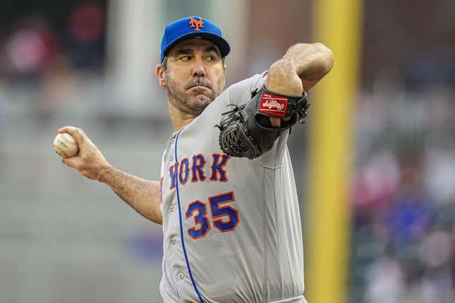 Jun 8, 2023; Cumberland, Georgia, USA; New York Mets starting pitcher Justin Verlander (35)  pitches against the Atlanta Braves during the first inning at Truist Park.