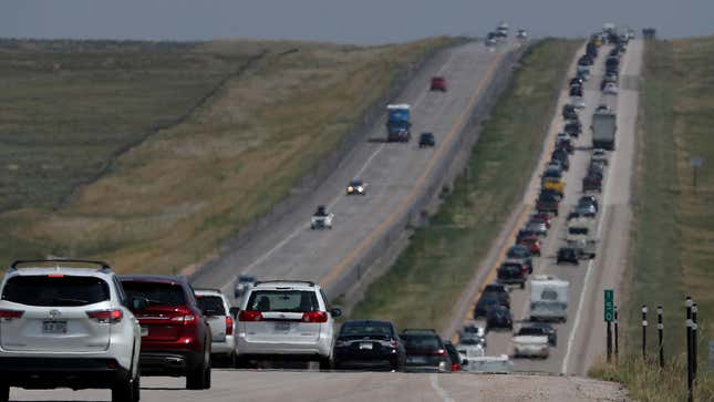 A photo of traffic backed up on a highway in Wyoming. 