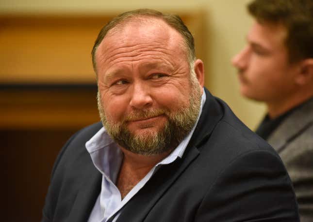 Infowars founder Alex Jones appears in court to testify during the Sandy Hook defamation damages trial at Connecticut Superior Court in Waterbury, Conn., on Thursday, Sept. 22, 2022. A six-person jury reached a verdict Wednesday, Oct. 12, 2022, saying that Jones should pay $965 million to 15 plaintiffs who suffered from his lies about the Sandy Hook school massacre. Jones and his company were found liable for damages last year.