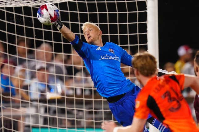 Jul 15, 2023; Commerce City, Colorado, USA; Colorado Rapids goalkeeper William Yarbrough (22) makes an incredible save against the Houston Dynamo FC during the second half at Dick&#39;s Sporting Goods Park.