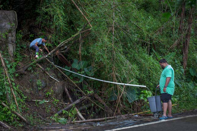puerto ricans collect mountain runoff after maria