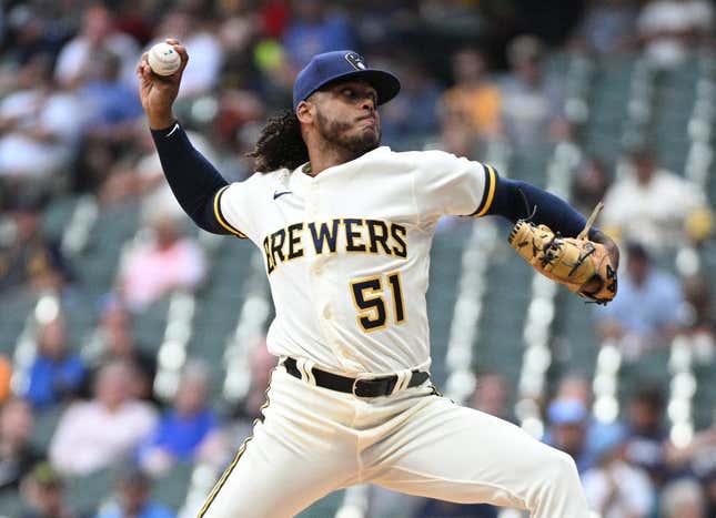 Aug 7, 2023; Milwaukee, Wisconsin, USA; Milwaukee Brewers starting pitcher Freddy Peralta (51) delivers a pitch against the Colorado Rockies in the first inning at American Family Field.