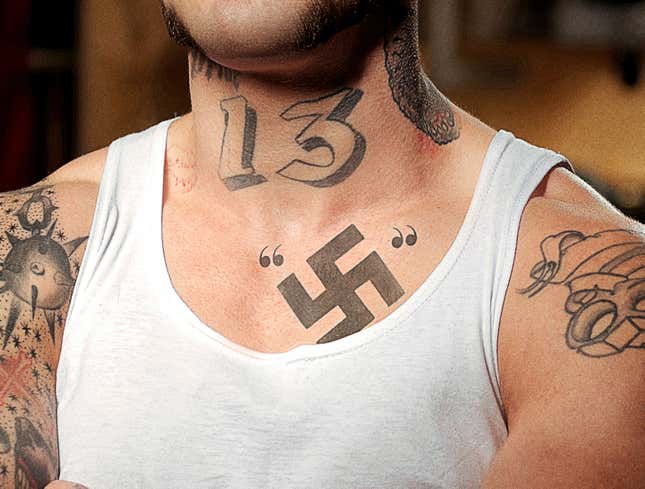 Image for article titled Reformed Nazi Puts Swastika Tattoo In Sarcastic Quotation Marks