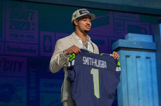 Apr 27, 2023; Kansas City, MO, USA; Ohio State wide receiver Jaxon Smith-Njigba on stage after being selected by the Seattle Seahawks twentieth overall in the first round of the 2023 NFL Draft at Union Station.