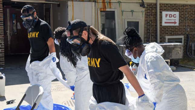 Members of Task Force 31, a U.S. military group that decontaminates long term care facilities, wear PPE in Huntsville, Alabama on March 6, 2020.