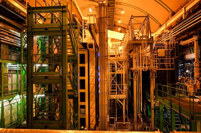 The LHCb experiment in its experimental hall. MoEDAL sits in a small nook on the righthand side of the picture. Photo: Ryan F. Mandelbaum/Gizmodo.