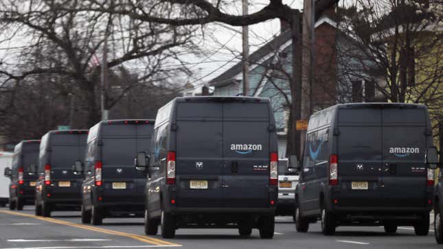 Amazon vans are shown delivering packages on March 30, 2020 in Hicksville, New York