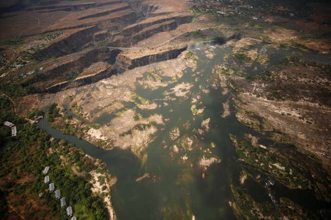 A dry section of the Zambezi river is seen above the gorge on the Zambian side of Victoria Falls, Zambia, following a prolonged drought, Dec. 5, 2019.