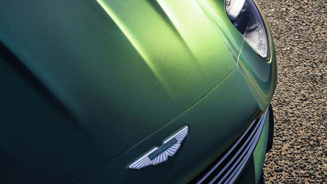 A photo of the Aston martin badge on the DB12. 