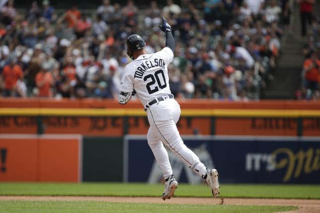Jul 23, 2023; Detroit, Michigan, USA; Detroit Tigers infielder Spencer Torkelson (20) hits a home run during the first inning of the game against the San Diego Padres at Comerica Park.