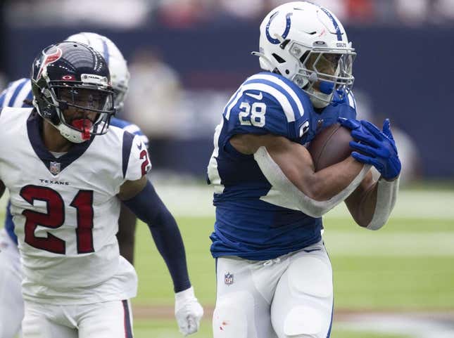 Sep 11, 2022; Houston, Texas, USA; Indianapolis Colts running back Jonathan Taylor (28) rushes against Houston Texans cornerback Steven Nelson (21) in the first quarter at NRG Stadium.