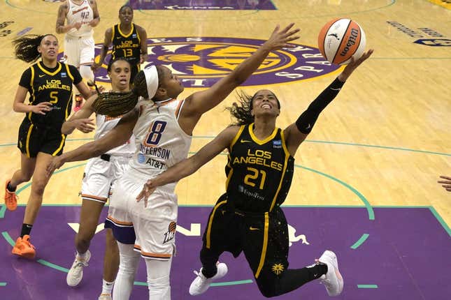 May 19, 2023; Los Angeles, California, USA; Phoenix Mercury guard Moriah Jefferson (8) blocks a shot by Los Angeles Sparks guard Jordin Canada (21) in the first half at Crypto.com Arena.