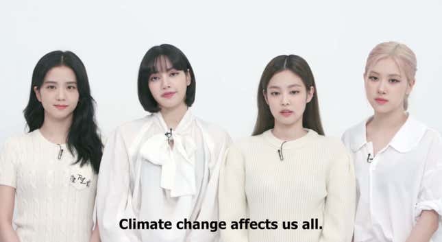 Blackpink give a pre-recorded talk about about climate change. The on-screen text reads, "Climate change affects us all."