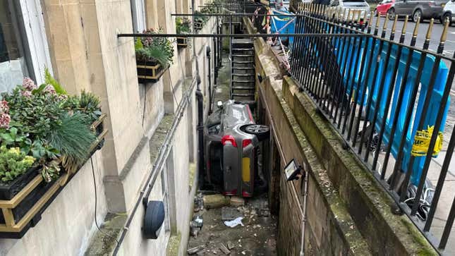 Image for article titled Man Wedges Car Into Basement Alley of 165-Year-Old Hotel in England