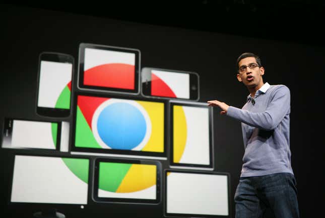 Sundar Pichai, Alphabet's CEO, stands in front of several screens displaying the Chrome logo.