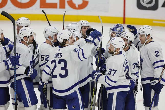 Apr 10, 2023; Sunrise, Florida, USA; Toronto Maple Leafs players celebrate after an overtime win against the Florida Panthers at FLA Live Arena.