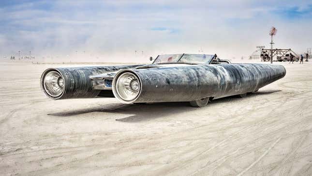A photo of the Rocket Car, which is 40-feet long and features huge headlights 