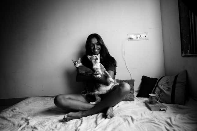 Mariette Valsan and her adopted cats at her Chapel Road home in Bandra, Mumbai. Nov 9, 2015
