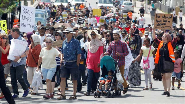 Protesters march toward the Ottawa police station in protest of the death of Abdirahman Abdi.