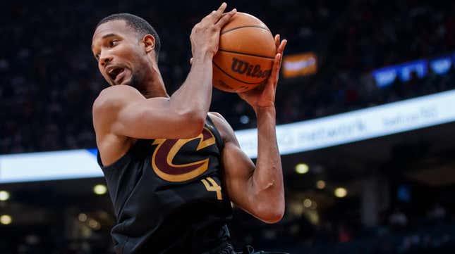 The Cavs’ Evan Mobley grabs a rebound during the second half of their NBA game against the Toronto Raptors at Scotiabank Arena on Oct. 19, 2022, in Toronto, Canada.