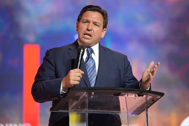 Florida’s Republican Gov. Ron DeSantis addresses attendees during the Turning Point USA Student Action Summit on July 22, 2022, in Tampa, Fla. Newly released police bodycam footage shows that three of the 20 people who were arrested in Florida for allegedly voting illegally in the 2020 election appeared to be surprised that they had done anything wrong. The recordings, made by local police and obtained by the Tampa Bay Times, were published Tuesday, Oct. 18, 2022, after DeSantis announced charges against the suspects in August as the first major public move of his controversial election police unit.