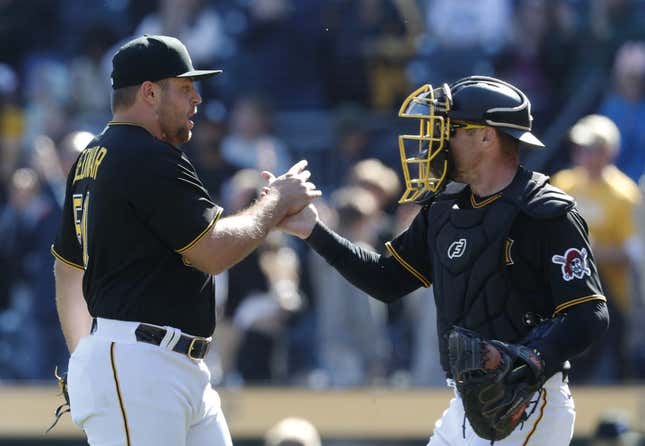 Apr 9, 2023; Pittsburgh, Pennsylvania, USA;  Pittsburgh Pirates relief pitcher David Bednar (51) and catcher Tyler Heineman (54) celebrate after defeating the Chicago White Sox at PNC Park. The Pirates shutout Chicago 1-0.