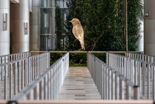 A sculpture titled 'Les Oiseaux' pictured behind a taxi queue area during a media preview of Changi Airport's Terminal 4 building in Singapore, 25 July 2017. Singapore's Changi Airport Terminal 4 is slated to begin operations at the end of 2017 and will bring the total handling capacity of Changi Airport to 82 million passengers per year. The terminal is the first also to feature Fast and Seamless Travel (FAST) automated check-in and customs facilities. EPA/WALLACE WOON